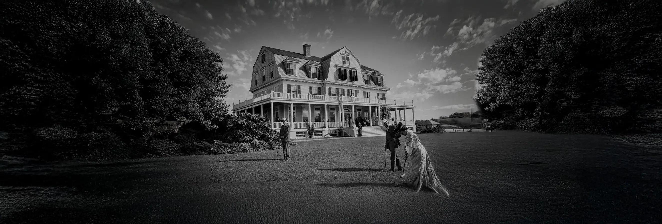 Historic Idylease with guests playing croquet on the lawn